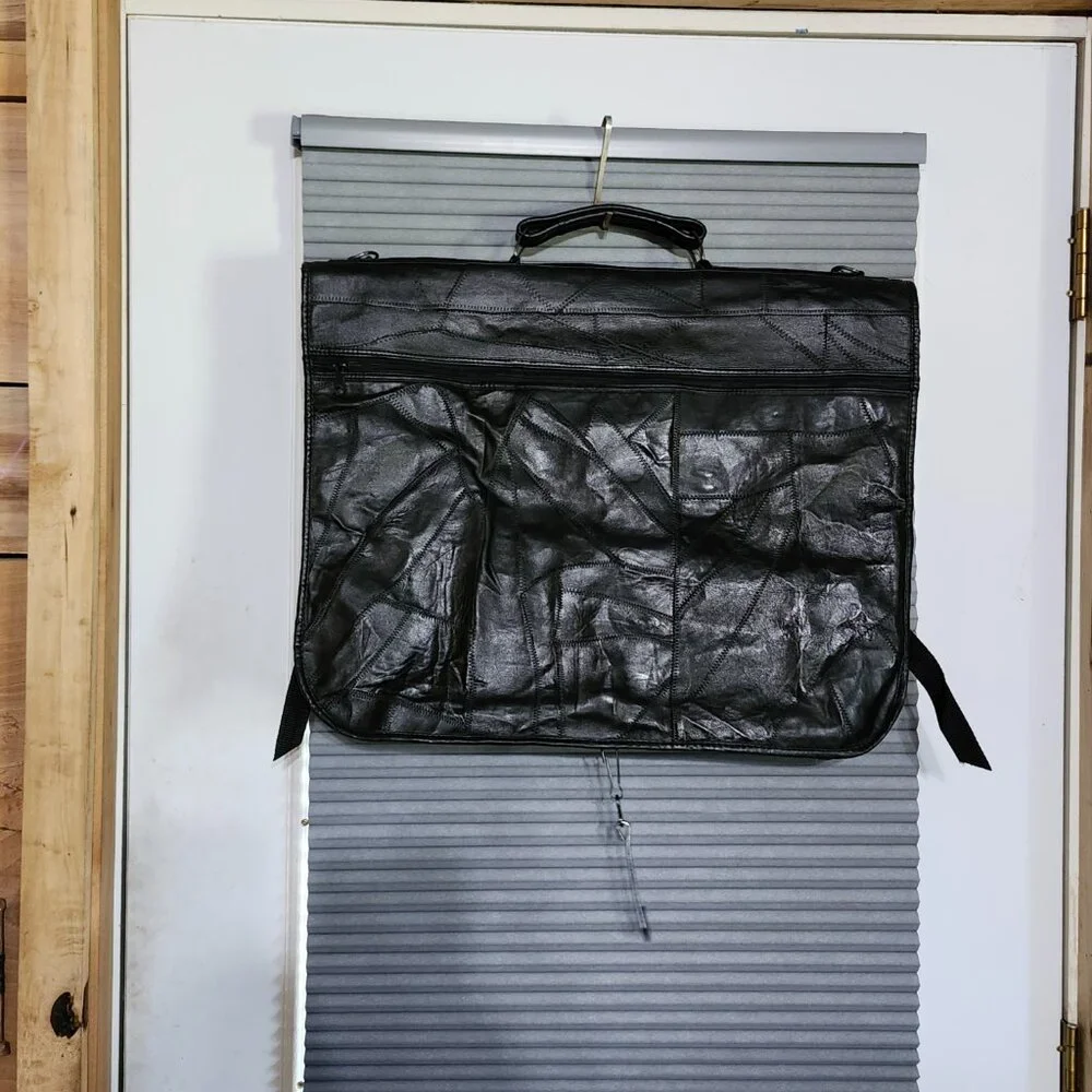 Vintage English Leather bi fold garment bag. NEW